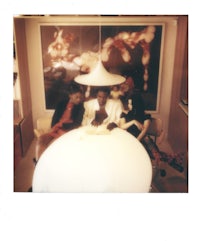 three people sitting around a table